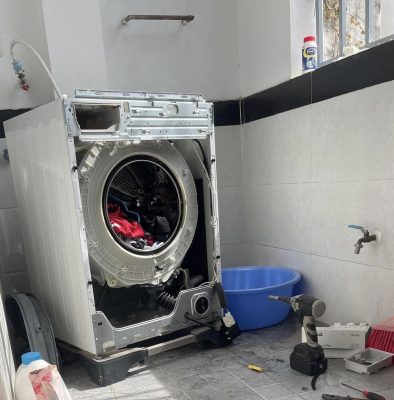 cửa máy giặt không đóng được