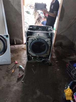 thay bơm xả máy giặt